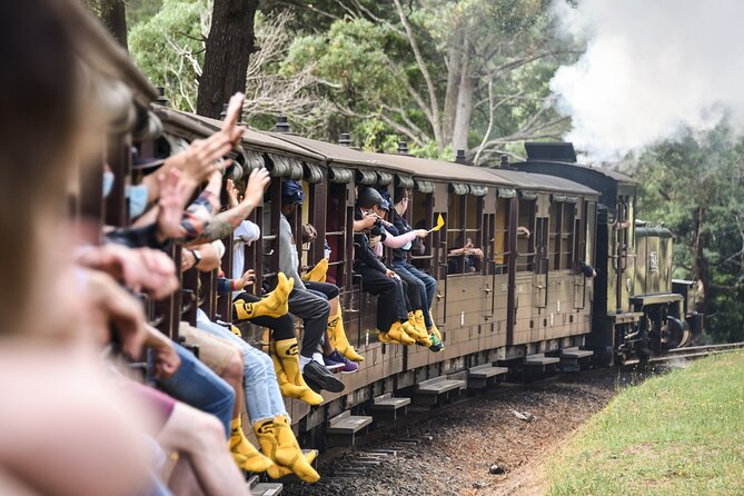 Melbourne Puffing Billy Train and Penguin Parade Day Tour Escape - Brighton Beach and the colorful bathing boxes